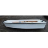 7'4" fibreglass pram dinghy with oars and rowlocks Please note descriptions are not condition