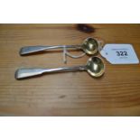 Pair of Georgian silver mustard spoons having Fiddle pattern handles and gilt bowls (0.58ozt) Please