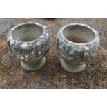 Pair of weathered goblet style urns - 15.25" tall Please note descriptions are not condition
