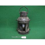 Small lamp with circular side fixing brackets, front plaque reads Launon Lamp Improved