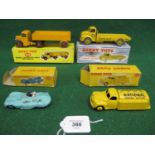 Four boxed Dinky vehicles to comprise: 238 Jaguar D Type in turquoise, 409 Bedford articulated lorry