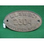 Cast iron oval wagon plate with square mounting holes to read L&SWR Co. 2304 Eastleigh Works, in