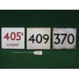 Three enamel bus stop E Plates: 405A Sunday (red letters), 409 and 370 with London Country 323 stuck