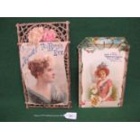 Two turn of the century card tobacco advertisements featuring young ladies in garden trellis
