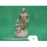 Brass radiator cap mascot of a blacksmith with anvil, hammer and wheel - 5" tall Please note