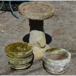 A circular bird bath and two small planters Please note descriptions are not condition reports,