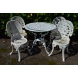 A white painted aluminium garden table and four chairs Please note descriptions are not condition