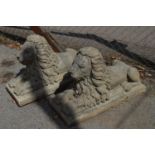 Pair of recumbent lion statues - 32"long x 13" wide Please note descriptions are not condition
