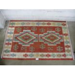 Kilim polychrome geometric rug with tassels - 1.94m x 1.30m Please note descriptions are not