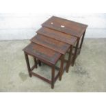 Carved and inlaid nest of four hardwood tables - 21" wide Please note descriptions are not condition