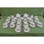 Royal Doulton Autumn's Glory teaset to comprise: sixteen tea cups, sixteen saucers, two teapots,