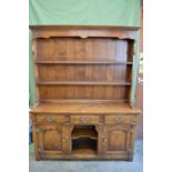 Late 20th century oak dresser of small proportions - 54" wide x 67" tall Please note descriptions