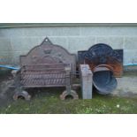 Two iron fire backs, fire grate and dogs, coal scuttle and metal box Please note descriptions are