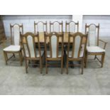 Ercol Burford (954) table - 63.5" wide with three leaves and eight Wheatsheaf (956) chairs Please