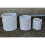 Set of three marble effect circular planters - largest 14.75" tall Please note descriptions are