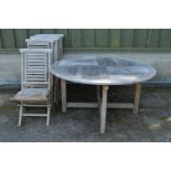 Circular wooden garden table - 59" dia and six folding chairs Please note descriptions are not