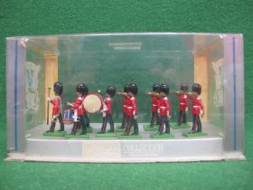 Ten hand painted Britains metal figures of Guardsmen Drum and Bugle Band in a Perspex display case -