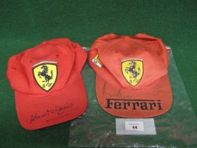 Two Ferrari baseball caps, one is an official product, both signed on the peaks by Derek Bell & Rene