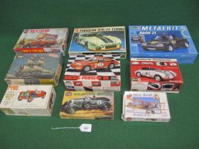 Nine boxed unmade plastic and metal car, plane and ship kits from: Revell, Bandai, Airfix, Pyro