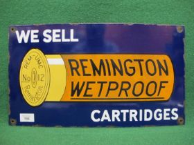 Enamel advertising sign for We Sell Remington Wetproof Cartridges featuring a large No. 12