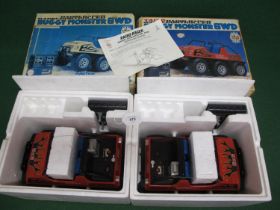 Two boxed Taiyo radio controlled Buggy Monster 6WD's, battery powered (batteries and chargers were