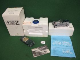 Two Franklin Mint metal and plastic models of a 1961 Jaguar E Type and a 1907 Rolls Royce Silver