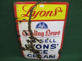 Enamel advertising sign in the form of a news stand with a red Lyons' on a yellow ground at the top,