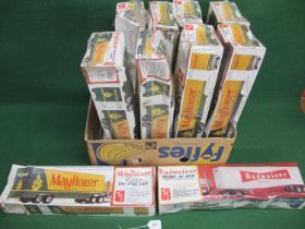 Ten boxed (crumpled) un-made plastic 1:25 scale Artic trailer kits from AMT (USA). Nine are of