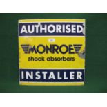 Square aluminium sign for Monroe Shock Absorbers Authorised Installer, white and blue letters on a