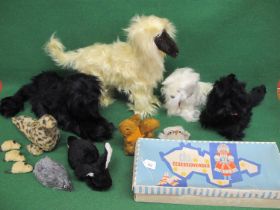 Four hairy soft toy dogs purchased in the 1970's together with other animals (no identifying