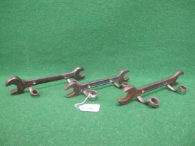 Three bespoke workshop wall mounted hooks made from open ended and ring spanners with pre-drilled