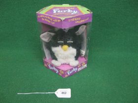 1998 Skunk Furby made by Tiger Electronics with instruction manual and Furbish-English Dictionary,