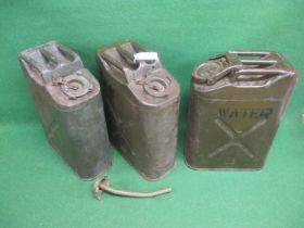 Three US Jerry cans to comprise: two fuel (1951 and 1980) one of which has a flexible nozzle and one