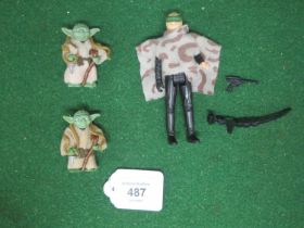Two 1980 LFL Hong Kong Yoda figures with snake belts, capes and sticks together with 1985 Luke