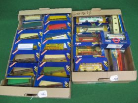 Twenty two Corgi buses and coaches in blue and yellow boxes comprising various liveries to