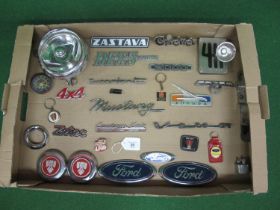 Box of vehicle marque badges to include: Mustang, Supervan III, Custom Cab, Viva, Futura, Dees Of