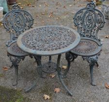 Iron patio table - 24.5" wide and a pair of matching chairs Please note descriptions are not