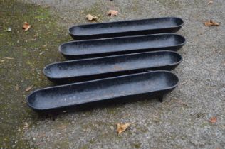 Set of four small iron water/feed troughs with rounded ends - 24" long Please note descriptions