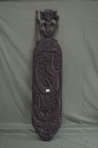 Possibly African wooden shield carved with animals - 52.5" tall Please note descriptions are not