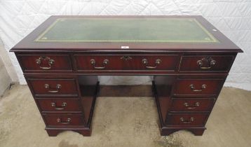 Reproduction mahogany pedestal desk having green leather insert - 48" wide Please note