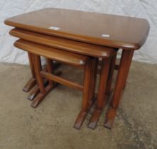 Nest of three Ercol coffee tables Please note descriptions are not condition reports, please request