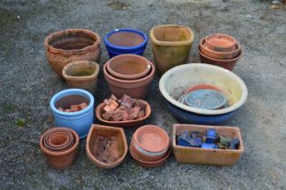 Quantity of terracotta and glazed plant pots of various shapes and sizes Please note descriptions