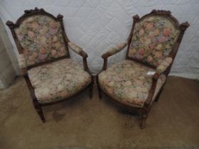 Pair of French carved showwood framed armchairs with padded backs, arms and seats Please note