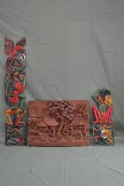 Two painted wooden wall carvings - 39.25" and 20.75" tall together with one other wood carving of