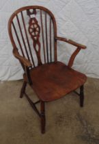 Yew wood and elm seated wheelback Windsor style chair Please note descriptions are not condition