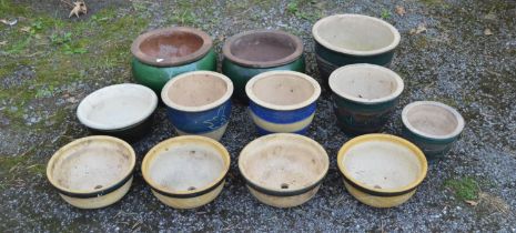 Group of twelve small circular glazed planters of various sizes Please note descriptions are not