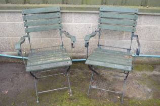 Pair of folding metal framed garden chairs with wooden slats Please note descriptions are not