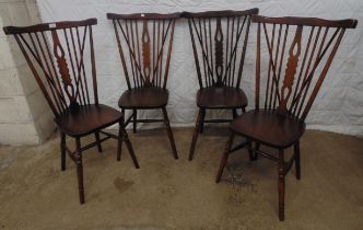 Set of four 20th century stick back chairs - each 22.5" wide x 41" high Please note descriptions are