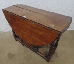Oak gateleg table with bow ends and single drawer Please note descriptions are not condition