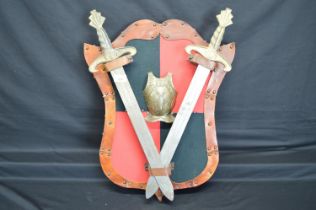 Modern wall hanging shield with two crossed swords -swords 25.25" long Please note descriptions